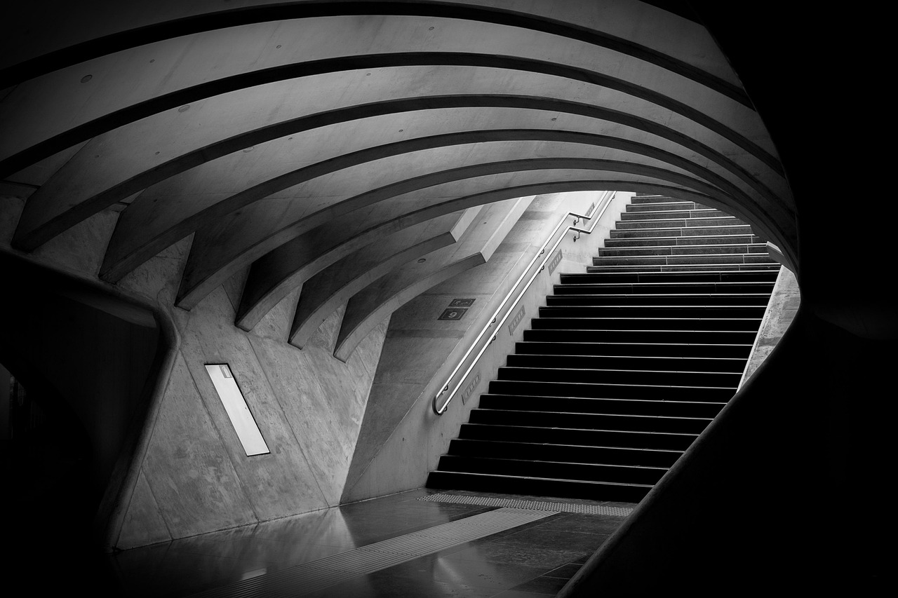 A monochrome steel and concrete tunnel