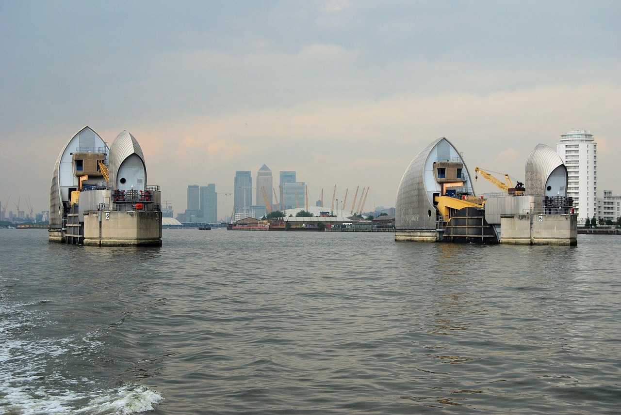 The Thames Barrier, with Canary Wharf behind it
