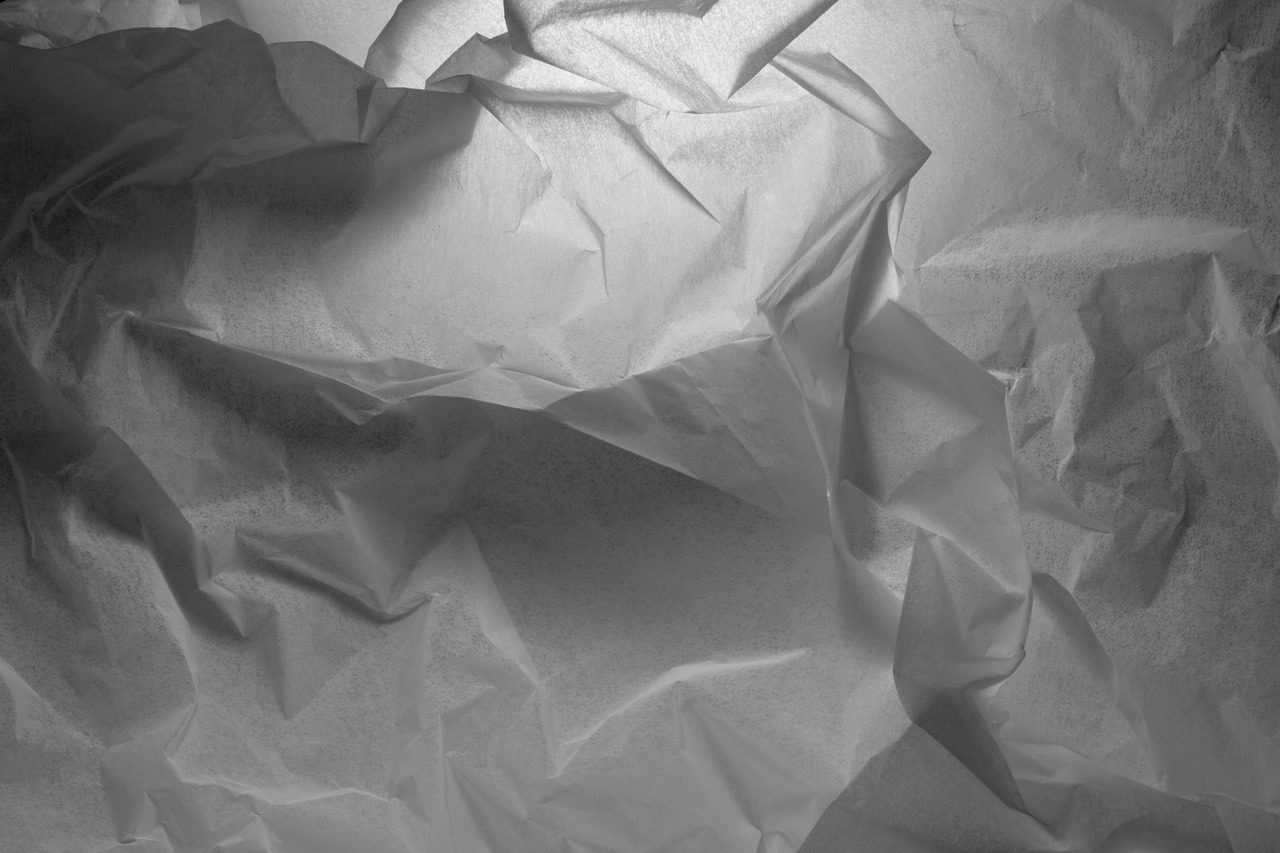 Crumpled tracing paper — the retired template